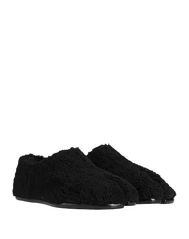 https://images.styletyx.com/images/black-pile-loafers-maison-margiela-488336_2.webp