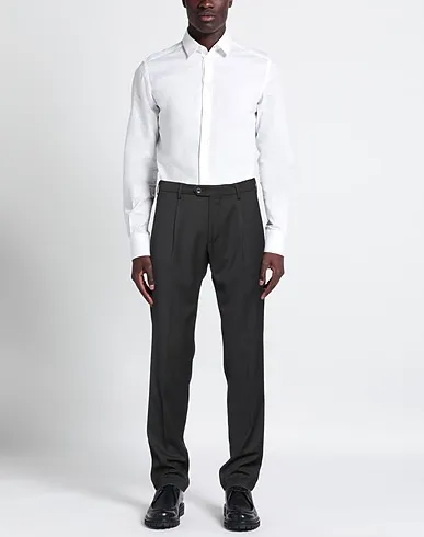 https://images.styletyx.com/images/black-plain-weave-casual-pants-luca-bertelli-1009887967_2.webp