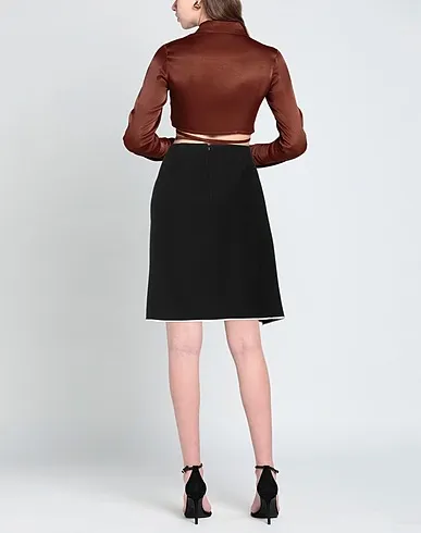 https://images.styletyx.com/images/black-plain-weave-midi-skirt-paule-ka-3123324_3.webp