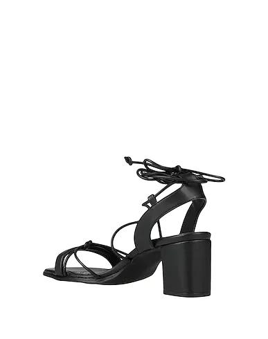 https://images.styletyx.com/images/black-sandals-alohas-1703607_3.webp