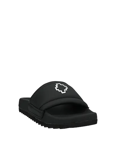 https://images.styletyx.com/images/black-sandals-marcelo-burlon-13086709_2.webp