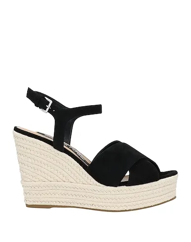 https://images.styletyx.com/images/black-sandals-sergio-rossi-13551228_1.webp