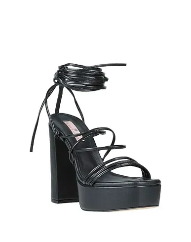 https://images.styletyx.com/images/black-sandals-tsakiris-mallas-12920653_2.webp