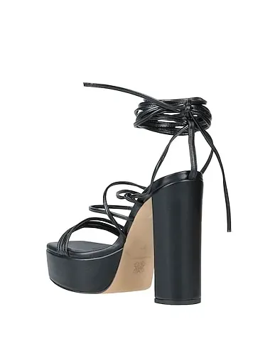 https://images.styletyx.com/images/black-sandals-tsakiris-mallas-12920653_3.webp
