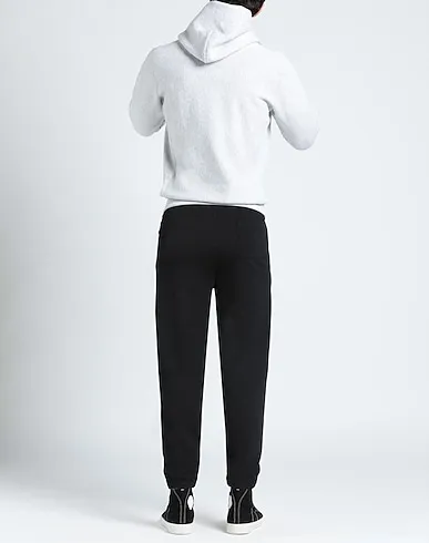 https://images.styletyx.com/images/black-sweatshirt-casual-pants-maison-kitsune-874539718_3.webp