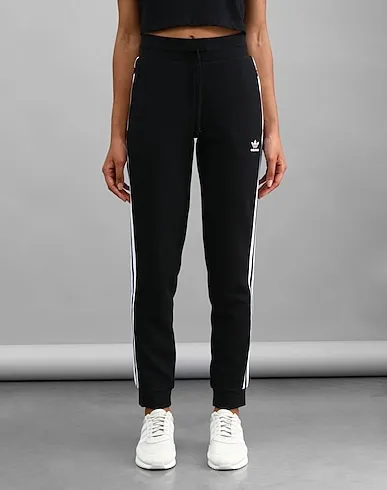 https://images.styletyx.com/images/black-sweatshirt-casual-pants-slim-pants-adidas-630365574_2.webp