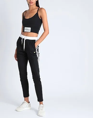 https://images.styletyx.com/images/black-techno-fabric-casual-pants-sst-trackpants-originals-adidas-878941121_4.webp