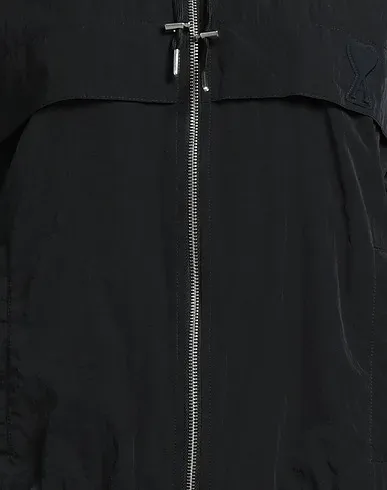 https://images.styletyx.com/images/black-techno-fabric-jacket-ami-alexandre-mattiussi-875749252_4.webp