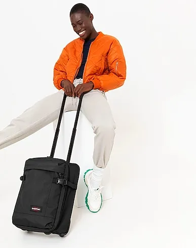 https://images.styletyx.com/images/black-techno-fabric-luggage-tranverz-xxs-eastpak-13136819_4.webp