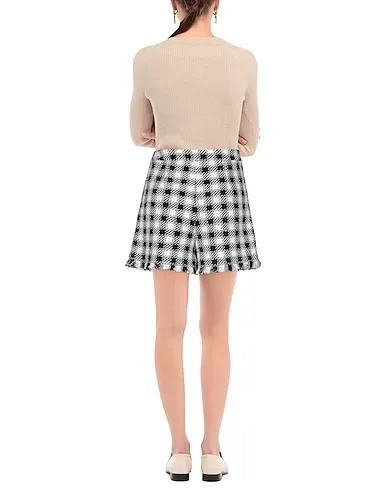 https://images.styletyx.com/images/black-tweed-shorts-bermuda-oscar-de-la-renta-989887_3.webp