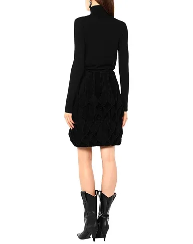 https://images.styletyx.com/images/black-velour-midi-skirt-alaia-1429732_3.webp
