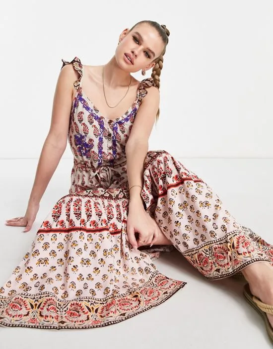 https://images.styletyx.com/images/blooming-trails-ruffle-strap-printed-maxi-dress-in-multi-raga-13454983_3.webp