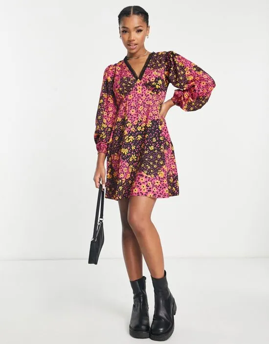 https://images.styletyx.com/images/blouson-sleeve-v-neck-mini-skater-dress-with-lace-trim-in-mixed-floral-print-influence-13276677_4.webp