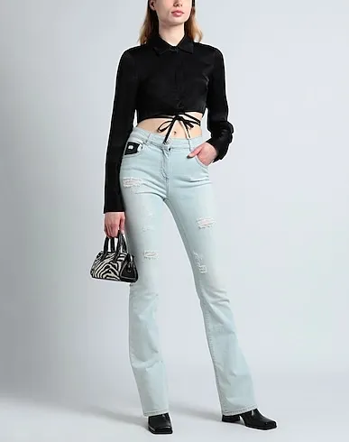 https://images.styletyx.com/images/blue-denim-denim-pants-john-richmond-1543548_2.webp