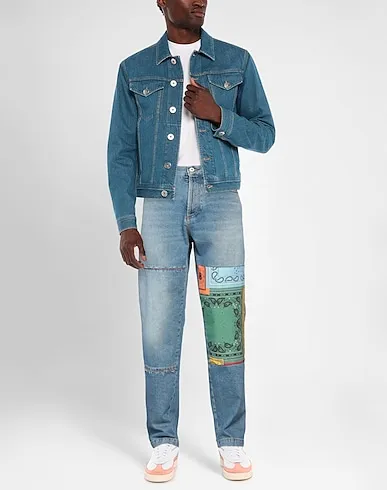 https://images.styletyx.com/images/blue-denim-denim-pants-marcelo-burlon-3145619_2.webp