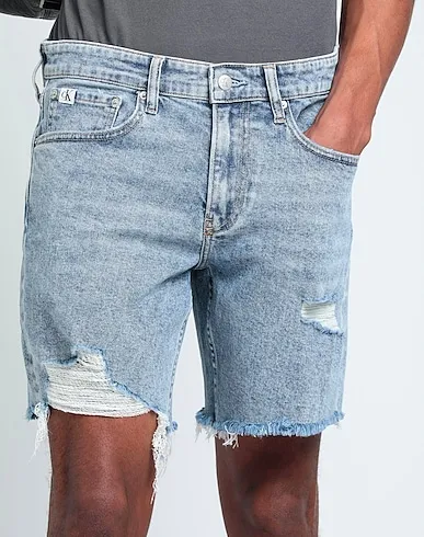 https://images.styletyx.com/images/blue-denim-denim-shorts-calvin-klein-1904990893_4.webp