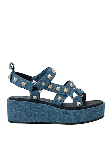 https://images.styletyx.com/images/blue-denim-sandals-maje-13065369_1.webp