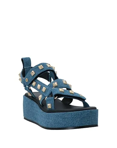 https://images.styletyx.com/images/blue-denim-sandals-maje-13065369_2.webp