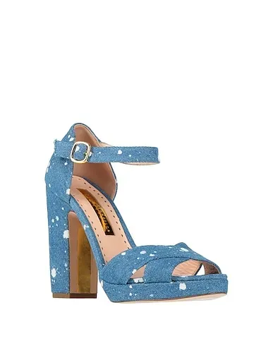 https://images.styletyx.com/images/blue-denim-sandals-rupert-sanderson-3062657_2.webp