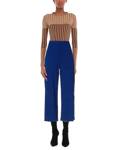 https://images.styletyx.com/images/blue-knitted-casual-pants-simon-miller-2438491_2.webp