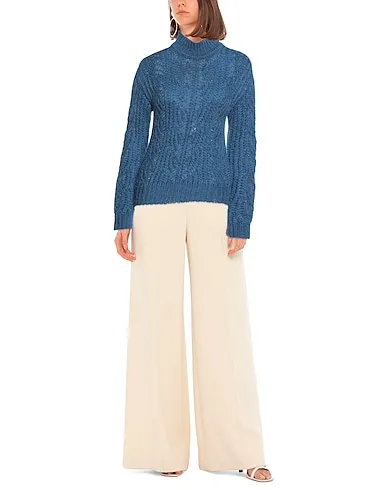 https://images.styletyx.com/images/blue-knitted-turtleneck-cacharel-764317_2.webp