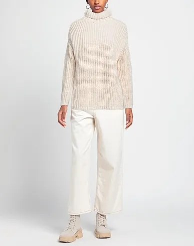 https://images.styletyx.com/images/blush-boiled-wool-turtleneck-sly010-3098129_2.webp