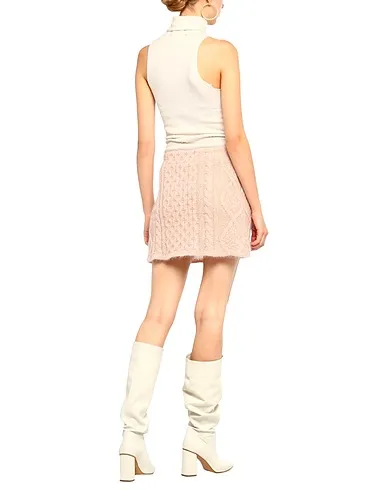 https://images.styletyx.com/images/blush-knitted-mini-skirt-laneus-3023917_3.webp