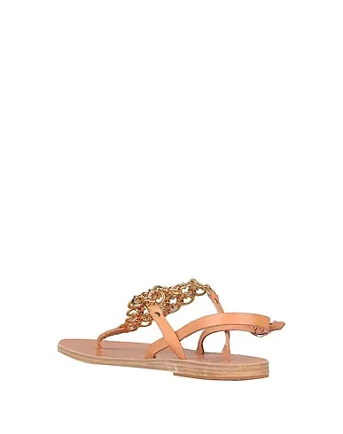 https://images.styletyx.com/images/blush-leather-flip-flops-ancient-greek-sandals-1632576_3.webp