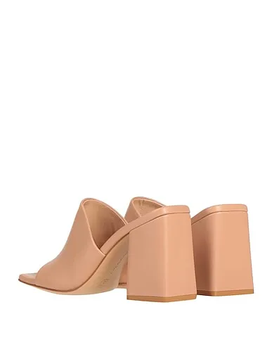 https://images.styletyx.com/images/blush-leather-sandals-gianvito-rossi-37490603_3.webp