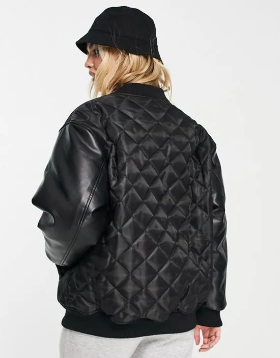 https://images.styletyx.com/images/bomber-jacket-with-faux-leather-sleeves-in-black-asos-design-2398267_2.webp
