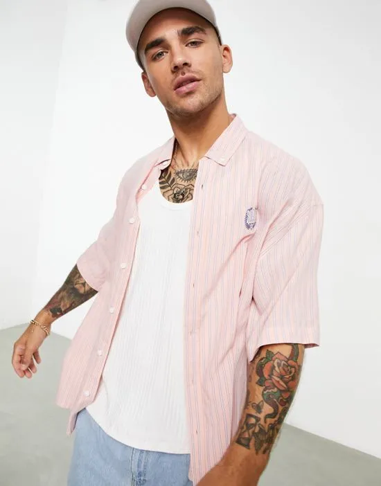 https://images.styletyx.com/images/boxy-oversized-button-down-collar-shirt-in-vintage-style-pink-stripe-with-chest-embroidery-asos-design-1792206_3.webp