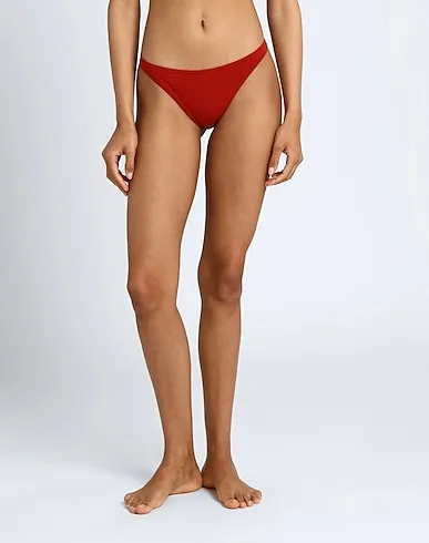 https://images.styletyx.com/images/brick-red-jersey-thongs-the-nude-label-679626_2.webp