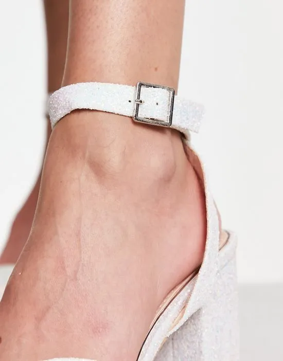 https://images.styletyx.com/images/bridal-alette-glitter-platform-sandals-in-white-and-silver-be-mine-12909871_2.webp