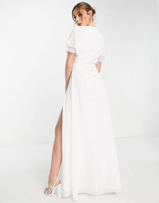 https://images.styletyx.com/images/bridal-embellished-wrap-maxi-dress-in-ivory-little-mistress-1838312_2.webp