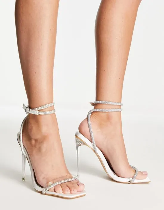 https://images.styletyx.com/images/bridal-emberly-clear-heeled-sandals-with-crystal-detail-be-mine-1739177_1.webp