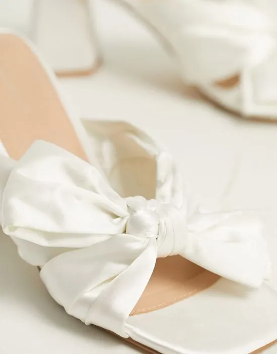 https://images.styletyx.com/images/bridal-exclusive-bow-front-mules-in-ivory-ever-new-13074656_2.webp