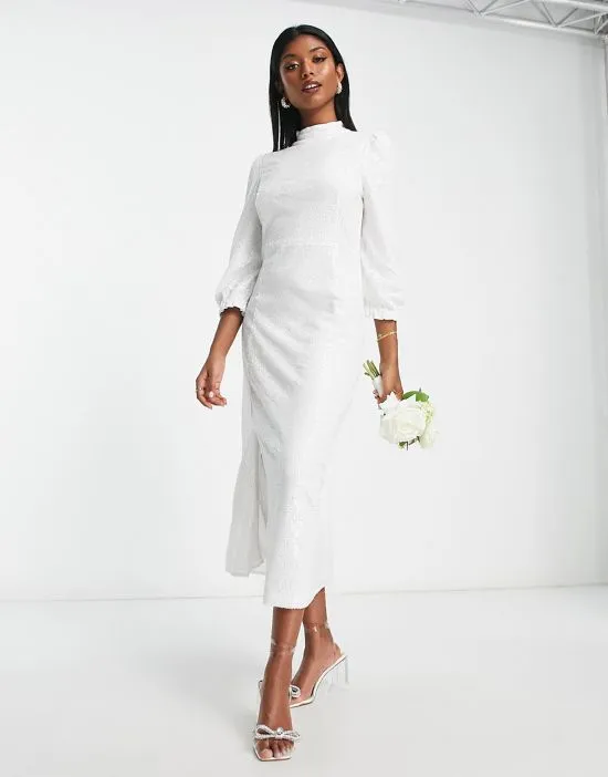 https://images.styletyx.com/images/bridal-long-sleeve-sequin-midi-dress-in-white-y-a-s-13093812_1.webp
