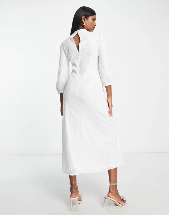 https://images.styletyx.com/images/bridal-long-sleeve-sequin-midi-dress-in-white-y-a-s-13093812_3.webp