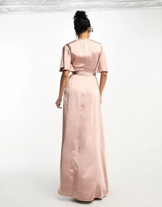 https://images.styletyx.com/images/bridesmaids-angel-sleeve-wrap-satin-maxi-dress-in-rose-six-stories-875263367_4.webp
