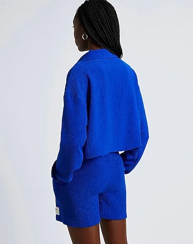 https://images.styletyx.com/images/bright-blue-crepe-solid-color-shirts-blouses-the-giving-movement-x-yoox-524799_3.webp