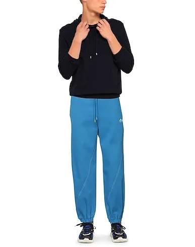 https://images.styletyx.com/images/bright-blue-sweatshirt-casual-pants-ader-error-902134_2.webp