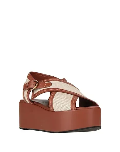 https://images.styletyx.com/images/brown-canvas-sandals-liviana-conti-3179847_2.webp