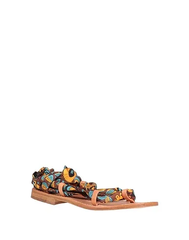 https://images.styletyx.com/images/brown-crepe-flip-flops-stringart-710774443_2.webp