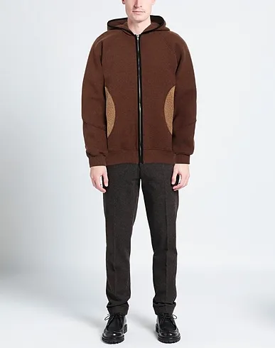 https://images.styletyx.com/images/brown-knitted-cardigan-arnar-mar-jonsson-1180401248_2.webp