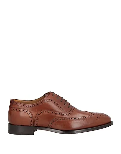 https://images.styletyx.com/images/brown-laced-shoes-calpierre-508005523_1.webp