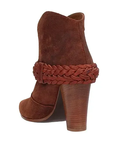 https://images.styletyx.com/images/brown-leather-ankle-boot-golden-goose-2738502_3.webp