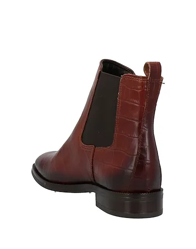https://images.styletyx.com/images/brown-leather-ankle-boot-pregunta-13155610_3.webp