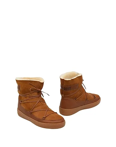 https://images.styletyx.com/images/brown-leather-ankle-boot-pulse-low-shearling-moon-boot-1445522_1.webp