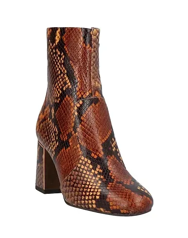 https://images.styletyx.com/images/brown-leather-ankle-boot-tory-burch-13035866_2.webp