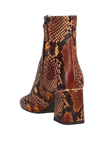 https://images.styletyx.com/images/brown-leather-ankle-boot-tory-burch-13035866_3.webp